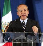 President Calderon promises probe into crash that killed 14 